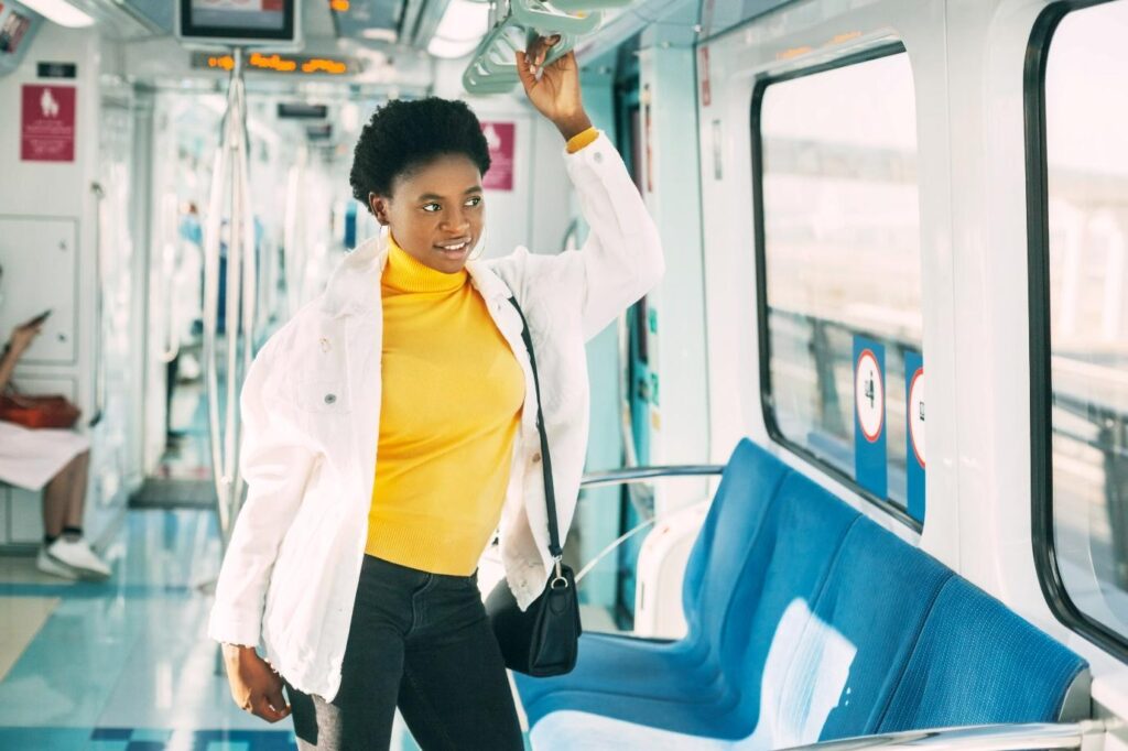 woman-standing-inside-dubai-metro