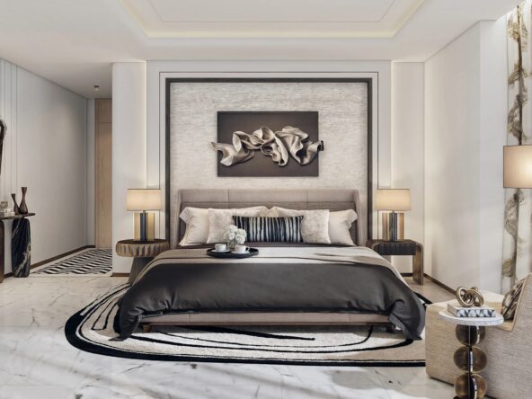 A luxurious modern bedroom with a king-sized bed featuring a gray headboard and plush bedding. The room is adorned with a large abstract painting, marble flooring, and stylish bedside tables at Sofitel Residences