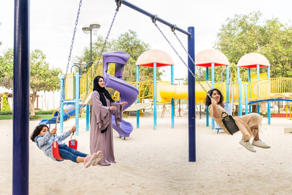 mother-is-playing-with her-children-at-deira-al-rigga-parks