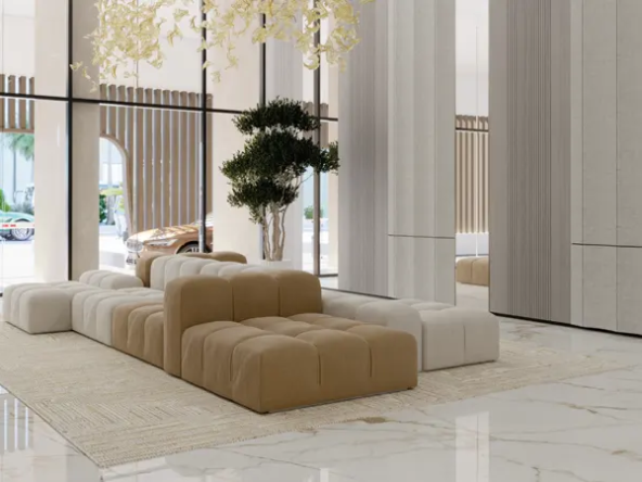 Stylish lobby with modern seating, marble flooring, and large windows offering natural light.