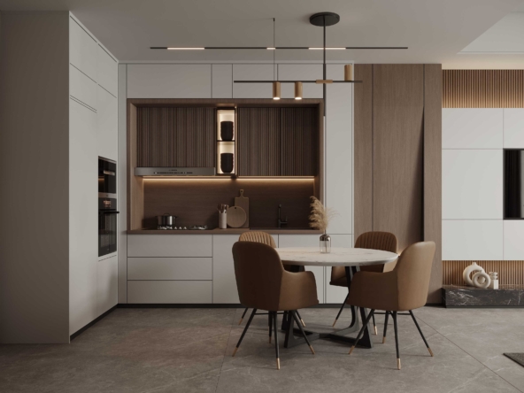 Modern Kitchen and Dining Room with White Cabinets and Wooden Accents at Electra JVC Dubai