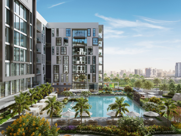 Modern residential building with swimming pool, lush landscaping, and palm trees in Arjan, Dubai. Arbor View by Ellington Properties.