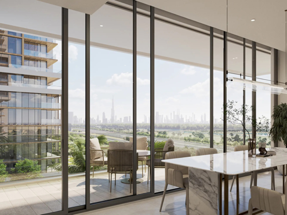 Spacious living area with floor-to-ceiling windows offering panoramic views of the Burj Khalifa and Dubai skyline.