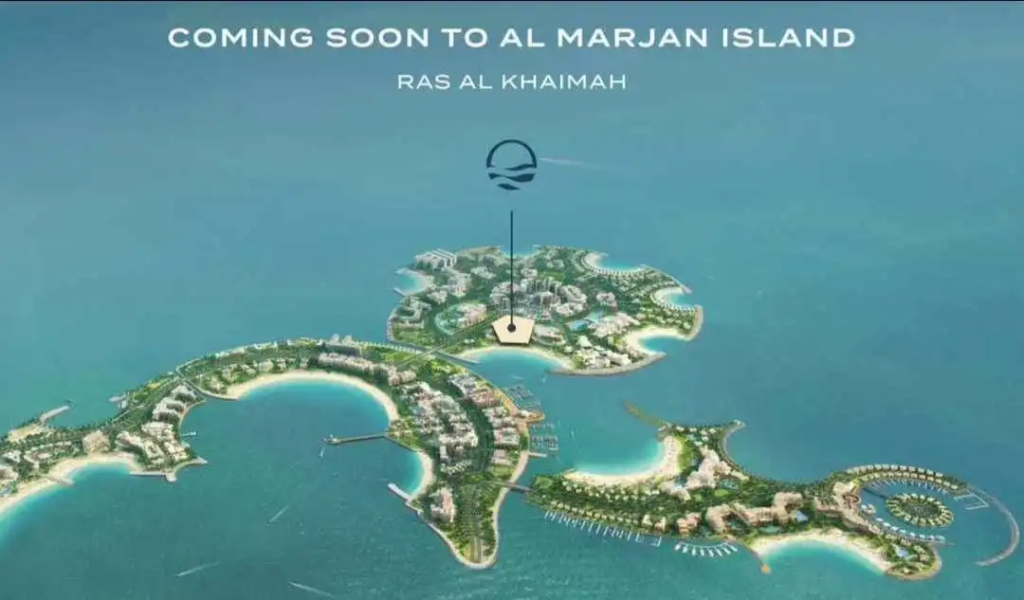 Aerial view of Al Marjan Island, Ras Al Khaimah, showcasing the upcoming development with a focus on the central island and surrounding waterfront.