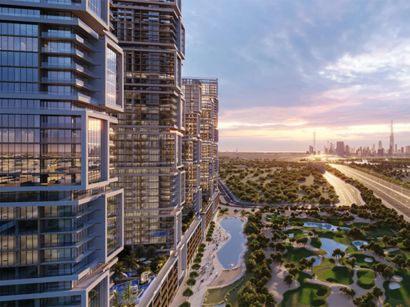 Stunning aerial view of interconnected luxury towers with a golf course, water features, and the Dubai skyline in the distance.